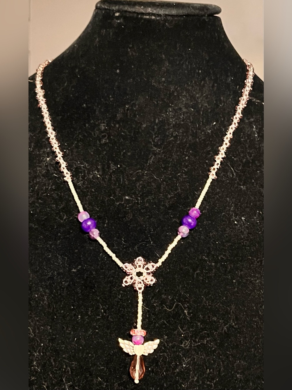 Gold-Tone Necklace with Purple Beads and Angel Pendant